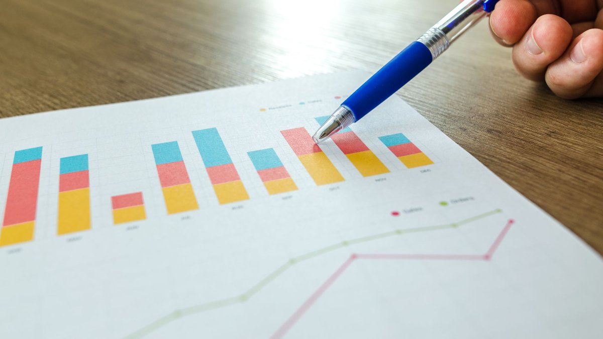 logistics manager studying charts